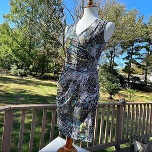 BCBG Maxazria wrap style dress in vibrant blue, yellow, black and white